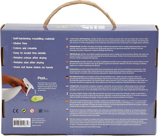 Boîte d'argile de modelage 'Silk Clay', avec des manuels en plusieurs langues et un vaporisateur.