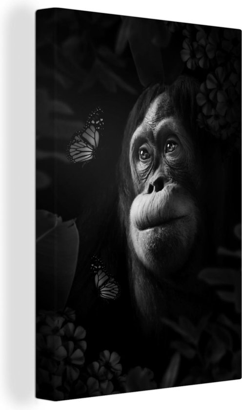 Canvas Schilderij Aap die naar vlinders kijkt in de jungle - zwart wit - 40x60 cm - Wanddecoratie