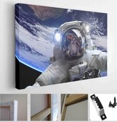 Astronaut in outer space against the backdrop of the space planet. Elements of this image furnished by NASA - Modern Art Canvas - Horizontal - 285316604 - 115*75 Horizontal