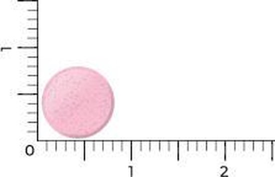 Roze, ronde smelttablet met gespikkeld oppervlak, afgebeeld op een schaal.