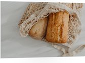 PVC Schuimplaat - Verse Broodjes in Gehaakt Tasje - 105x70 cm Foto op PVC Schuimplaat (Met Ophangsysteem)