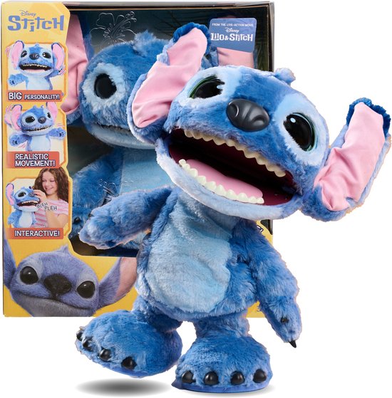 Interactieve blauwe Stitch-knuffel met roze oren en open mond in bijbehorende Disney Lilo & Stitch verpakking.
