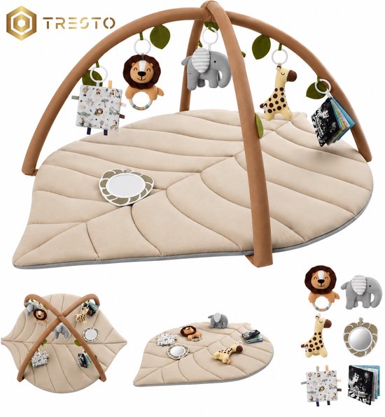 Beige babygym met blad-vormig speelkleed. Met een leeuw, olifant, giraf en spiegeltje aan de boog.