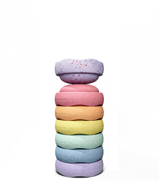 Een stapel van zes ronde Stapelstein-elementen in pastelkleuren, met bovenaan een gespikkelde paarse variant.