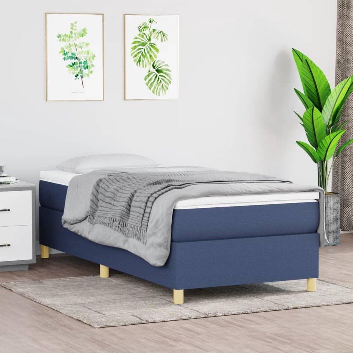 bed 90x190 cm stof blauw met stevige poten en multiplex lattenbodem voor optimale ondersteuning en comfort in elke slaapkamer
