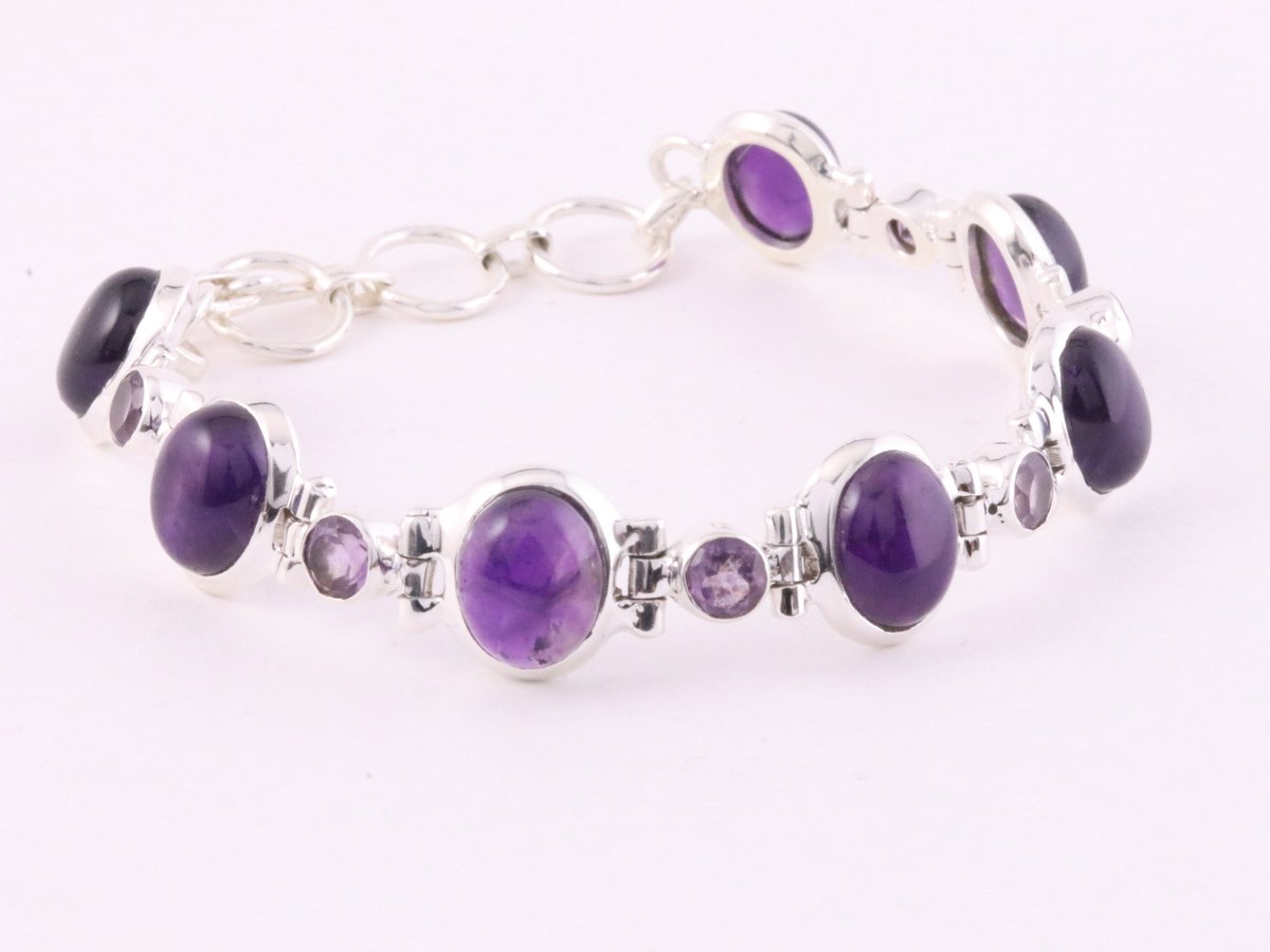 Zware zilveren schakelarmband met amethist