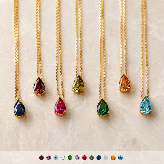 Meerdere gouden kettingen met druppelvormige edelstenen in verschillende kleuren: donkerblauw, rood, groen, geel, oranje en lichtblauw.