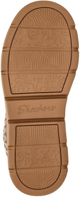Onderkant van de zool met bloemmotieven en Skechers merknaam.