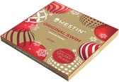 Gouden Westin 2026 adventskalender met kerstballen, sneeuwvlokken en een 'Golden Ticket' winactie.