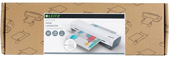 Kartonnen verpakking van Leitz iLAM A3-lamineerapparaat met afbeelding van witte machine en kindertekening.