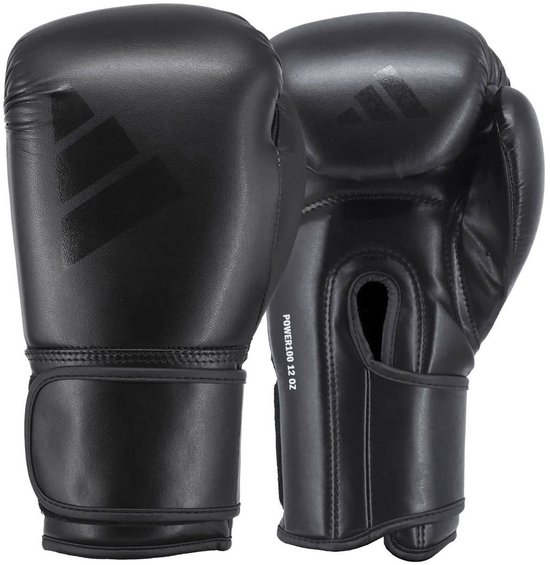 Paar zwarte adidas bokshandschoenen met 'POWER100 12 OZ' opdruk.