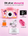 Complete set: roze eenhoorncamera, 32GB microSD-kaart, USB-lezer, USB-C kabel, draagkoord en handleiding.