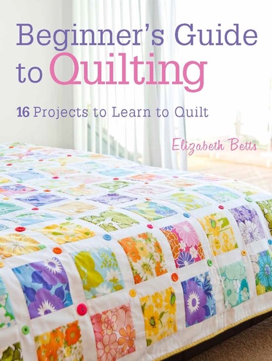 Boekomslag 'Beginner's Guide to Quilting' met een kleurrijke, gebloemde quilt op een bed.