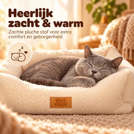 Grijze kat rust in zachte, warme, pluizige crème-kleurige Petville-mand. Tekst: Heerlijk zacht & warm voor comfort.