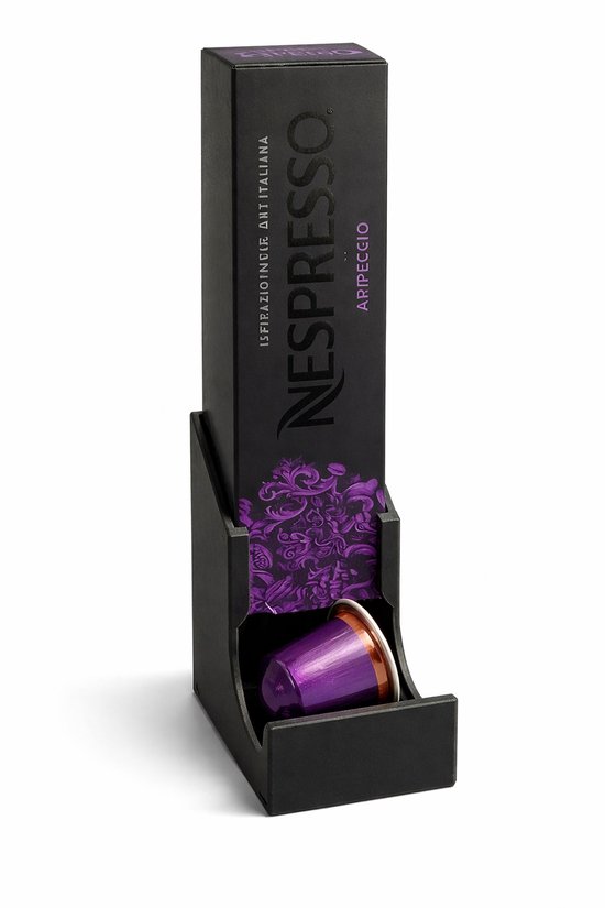 Zwarte Nespresso Arpeggio capsulehouder met een paarse koffiecapsule in een bloemmotiefverpakking.