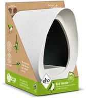 Witte vogelvoerder met spikkels in verpakking. Met tekst 'Bird feeder' en logo.