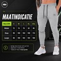 Grijze trainingsbroek met MW logo, ritszakken en trekkoord. Maattabel met maten S tot XXL. "Let op: deze broek valt over het algemeen 1 maat kleiner. Twijfel je? Kies 1 maat groter."