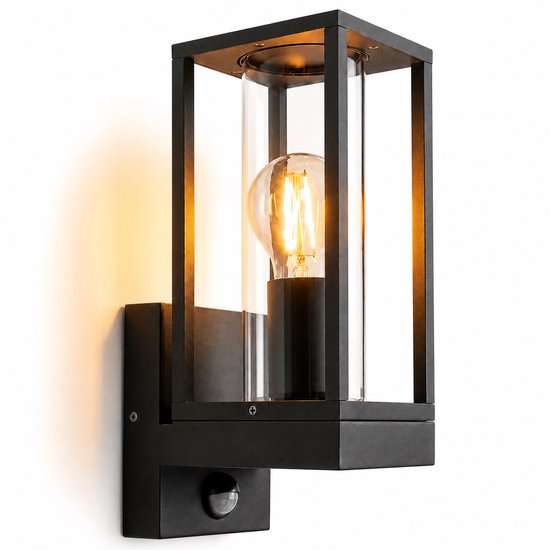 Moderne zwarte wandlamp met glazen cilinder en zichtbare E27 lamp, inclusief bewegingssensor.