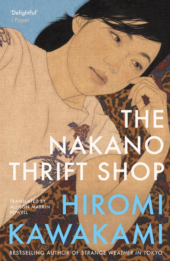 Boekomslag van 'The Nakano Thrift Shop' met een illustratie van een vrouw met donker haar, liggend op een kleurrijk patroon.