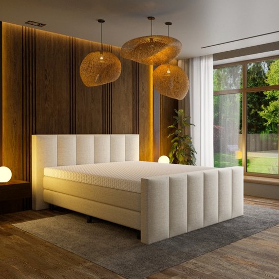 Moderne slaapkamer met een gestoffeerd bed, Mörgenn topper en hanglampen.