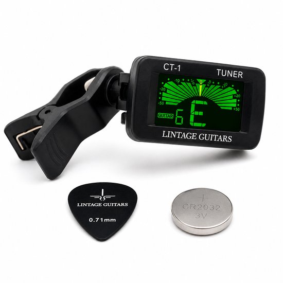 Een zwart clip-on stemapparaat met groen display, een plectrum en een batterij.