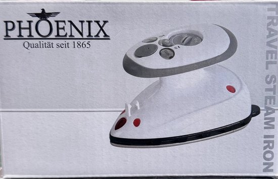 Witte Phoenix reisstoomstrijkijzer verpakt in doos met tekst "Phoenix Qualität seit 1865" en "TRAVEL STEAM IRON".