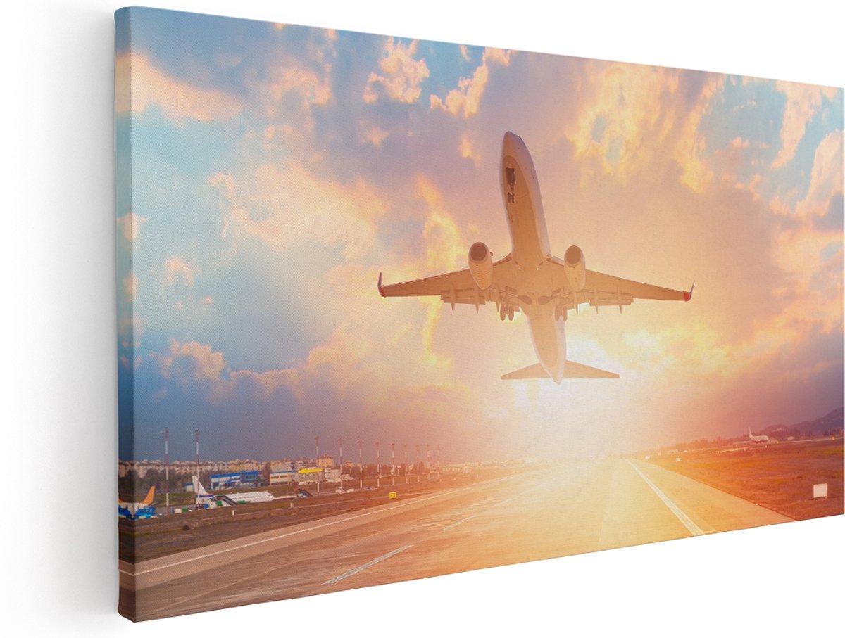 Artaza Canvas Schilderij Vliegtuig Stijgt Op Het Landingsbaan Met Zon - 180x90 cm - Groot - Wanddecoratie Woonkamer - Schilderijen - Muurdecoratie