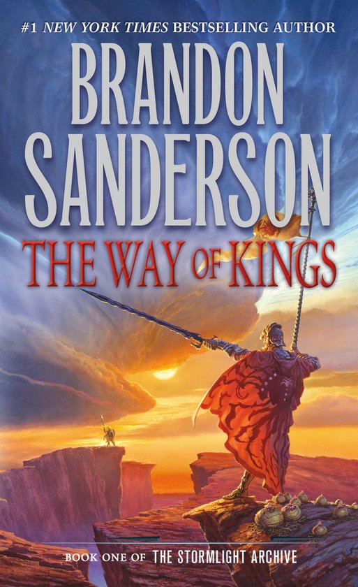 Livre 'The Way of Kings' de Brandon Sanderson, avec un guerrier en rouge sur un rocher, coucher de soleil.