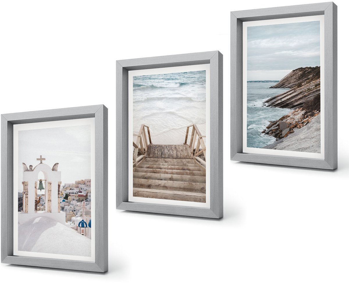 Coloray 4-Delige Schilderij Set - Uitzicht op de zee en de architectuur van Santorini tegen de hemel. - 20 x 30 cm - Wanddecoratie - Moderne Interieurdecoratie - Muurdecoratie Zilveren lijst