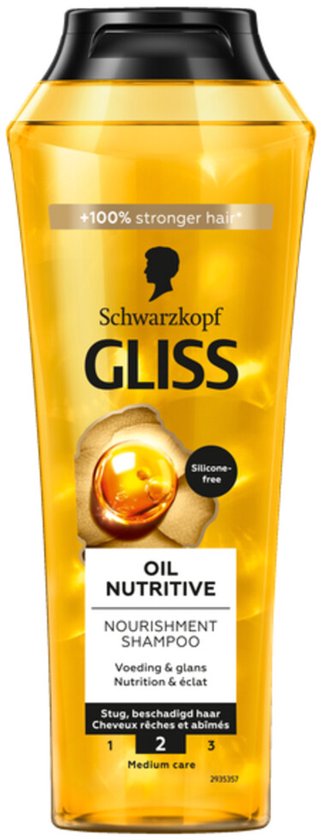 Gouden Gliss Oil Nutritive shampoo fles met zwarte dop en een afbeelding van gemberwortel.
