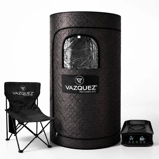 Zwarte ronde saunakabine met open rits, opklapstoel en saunahandleider. De kabine heeft een glazen raam en het logo 'VAZQUEZ RECOVERY PRO'.