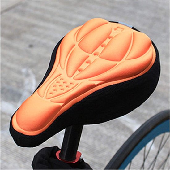 Oranje zadelhoes gemonteerd op een fietszadel, met ergonomisch 3D-ontwerp.