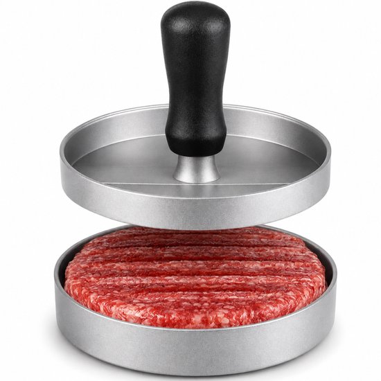 Presse à hamburger argentée avec poignée noire sur un burger grillé.