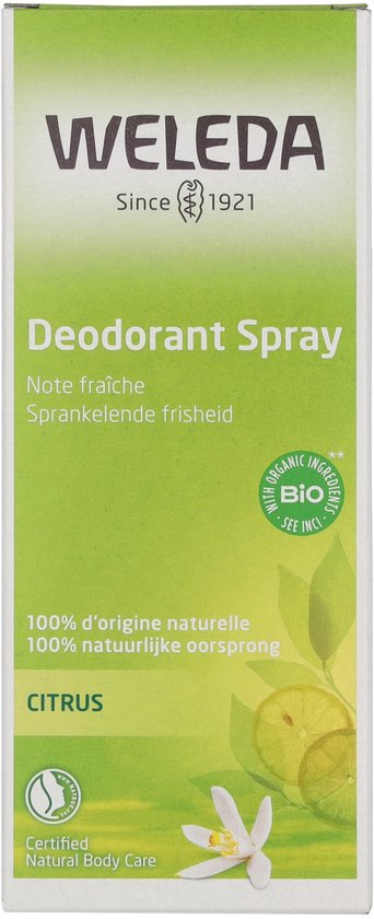 Weleda Citrus Deodorant Spray fles naast de kartonnen verpakking. Groene verpakking met citroenen en een bloem.