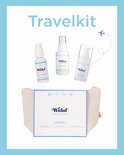 Witlof reisset met toilettas, reinigingsmelk, toner en gezichtscrème.