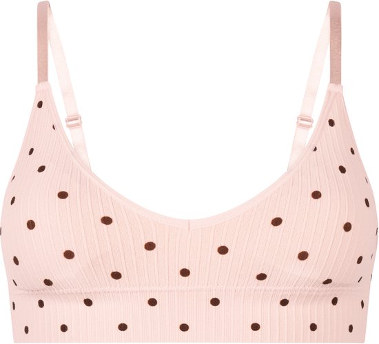 Voorkant van een roze geribbelde bralette met stippenprint en verstelbare schouderbandjes.