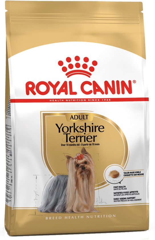 Gouden zak Royal Canin Yorkshire Terrier voer met een afbeelding van een hond met rode strik.