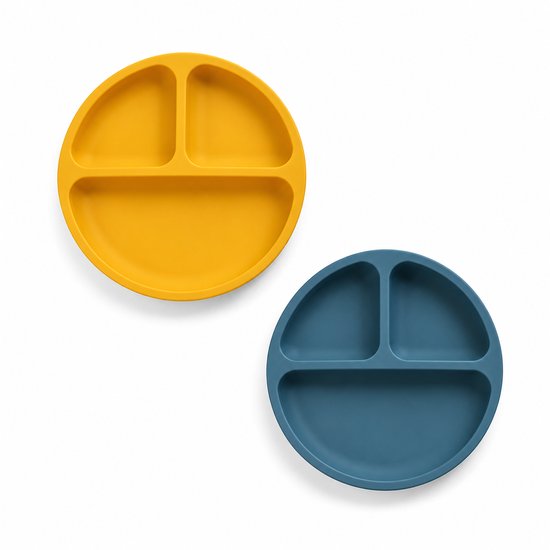 Twee ronde Vavida borden met drie vakken, een in okergeel en een in donkerblauw, tegen een witte achtergrond.