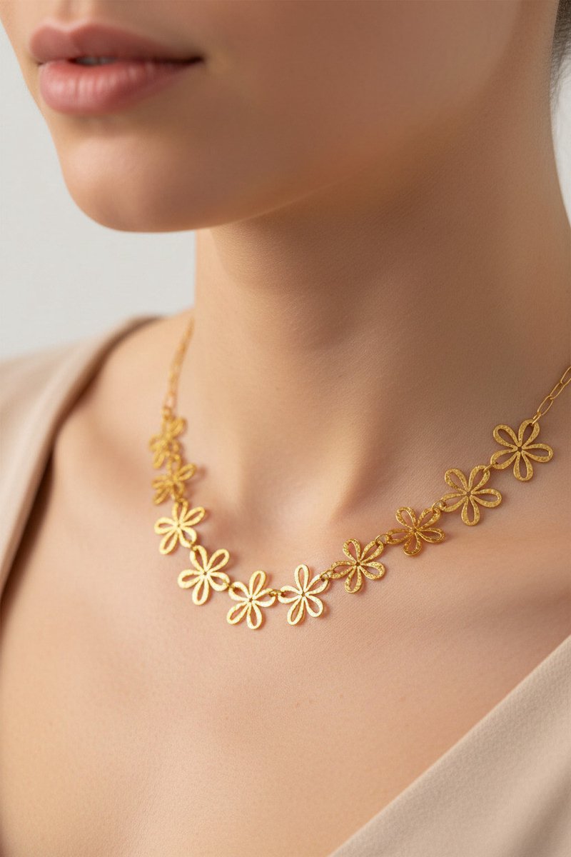 Bloemenketting dames – Goudkleurig RVS – Opengewerkte bloemen