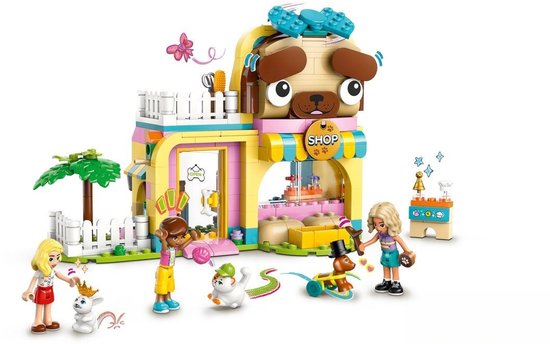 Animalerie LEGO Friends avec une grosse tête de chien comme toit, briques violettes, jaunes, bleues et roses. Comprend trois mini-poupées, un chiot, un chaton et un lapin.