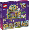 Boutique LEGO Friends avec espace de toilettage pour animaux, briques violettes, jaunes, bleues et roses. Comprend trois mini-poupées, un chiot, un chaton et un lapin.