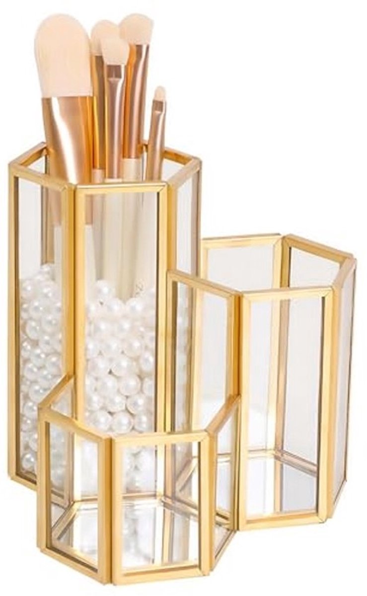 Elegante make-up en sieraden organizer met glazen bodem en gouddesign