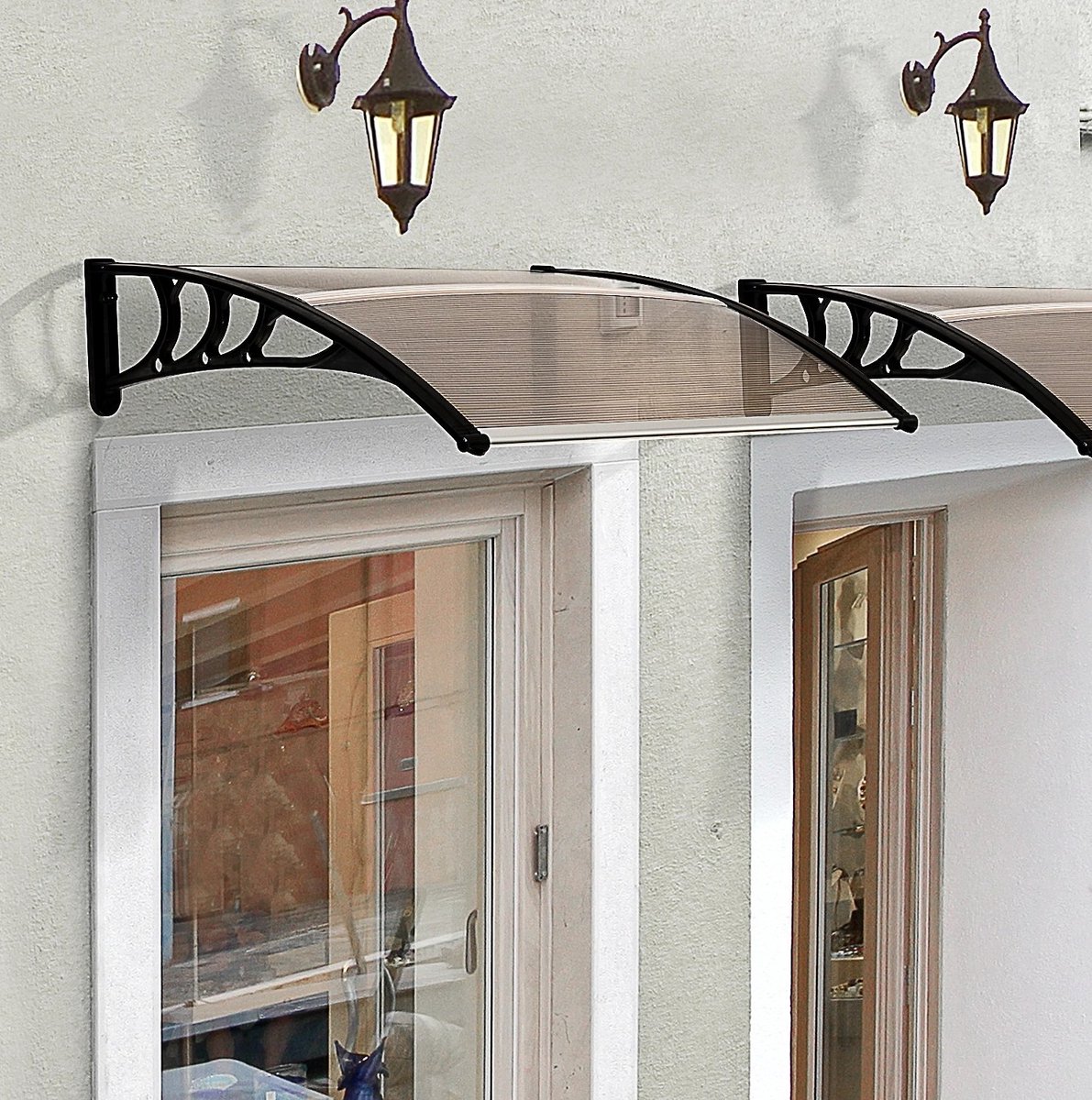 REDOM - Vordach voor voordeur - Polycarbonaat dakplaat - Aluminium draagarmen - Weerbestendig - Voor deur, raam en balkon - Aluminium, Kunststof - Bruin - 120 x 75 cm