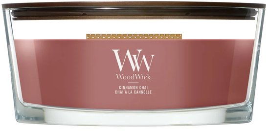 Een WoodWick Ellipse geurkaars met zalmroze wax en een deksel. De kaars heeft een gouden bandje met stippen en het WoodWick logo.