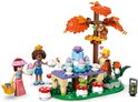 LEGO Friends bosfeest met tafel, cupcakes, boom, eekhoorn, kikker en 2 meisjesfiguren.