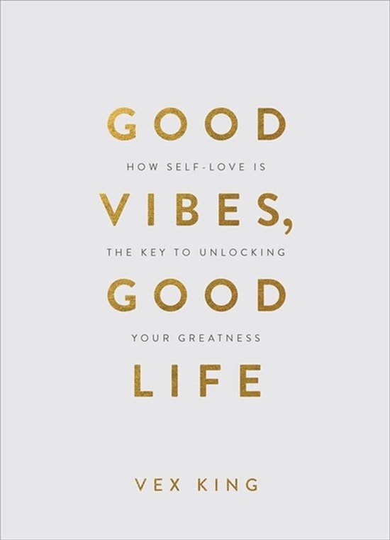Boek "Good Vibes, Good Life" met gouden letters op een grijze achtergrond. "Good Vibes, Good Life" staat centraal.