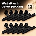 Tien zwarte, grote vershoudclips met een appel-logo, op een lichte achtergrond.
