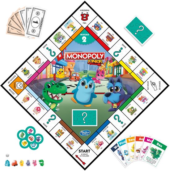 Monopoly Junior speelbord met dinosaurussen, kat, pinguïn, hond, geld en kaarten.