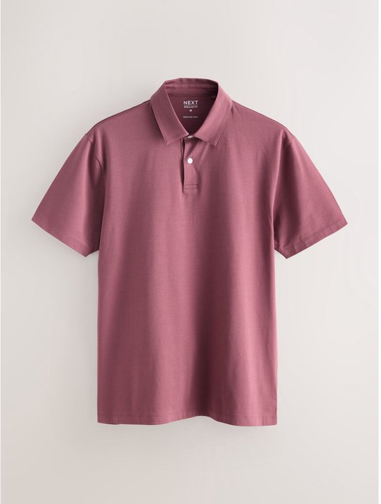 Een bordeauxrode poloshirt met korte mouwen en een knoopsluiting. Het shirt heeft een standaard pasvorm en is gemaakt van jersey.