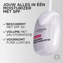 L'Oréal Revitalift Hyaluron Aqua-Fluid SPF30 in een paars flesje met pompje.